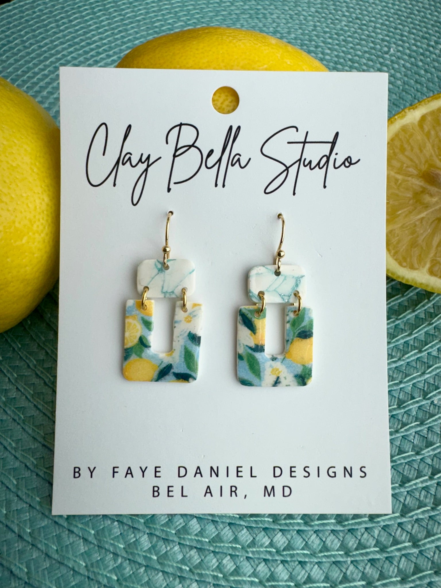 Handmade polymer clay earrings with aqua marble top and lemon patterned square drop