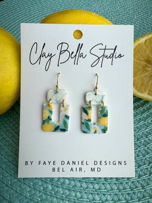 Handmade polymer clay earrings with aqua marble top and lemon patterned square drop